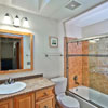 Bathroom Remodel Woodinville, WA: New Fiberglass Bath Tub with 13x13 Procelain Tile Shower Surround and 1/4 thick framed Glass enclosure
