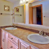 Bathroom Remodel Woodinville, WA: New Maple Bathroom Vanity with 12x12 Procelain Tile Counter Top and Custom Tile Back Splash