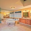 Bathroom Remodel in Mill Creek, WA: Bathroom Floor - Heated Limestone Tile Floor, Granite Counter Top with Undermounted Sinks and Custom Natural Stone Back Splash
