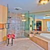 Bathroom Remodel Mill Creek, WA: Custom Shower. Natural Travertine Stone shower floor and Shower Curb, Porcelain 13x13 Shower Walls, 3/8 thick Frameless Custom Glass Shower Enclosure
