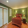 Home Addition Lynnwood, WA: Featuring - Master Bedroom, Oak Hardwood Flooring. Crown Molding. Custom Lighting. Custom Fiberglass in-swing french exterior patio door.