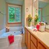 House Repair Edmonds, WA: AFTER Complete Bathroom Remodel. All new Porcelain Tile Flooring, new plumbing fixtures, New Custome Shower glass Enclosure. All new light fixtures. New paint job. New trim work. Re-laminated Counter Tops