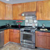 Home Addition Lynnwood, WA: Featuring - Kitchen with All GE Stainless Steel Appliances, Granite Kitchen Counter Tops (2cm Black Galaxy granite with full bull nose), Under-mounted stainless steel 33x22 sink. Maple wall and base cabinets