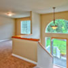 House Repair Edmonds, WA: AFTER All Drywall Replaced and finished, New attic Insulation, Wainscoting removed, New Carpet Installed, New Railing and all new Base board installed. All house is re-painted inside and outside. All new electrical outlets installed, all new Light Fixtures Installed