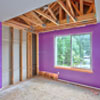 House Repair Edmonds, WA: BEFORE Picture of the bedroom area pre-restoration. Ceiling is destroyed by a fallen tree, wall finishes are destroyed by rain water, carpets are covered in mold, mill work needs replacing