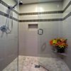 Bathroom Remodel Seattle. AFTER: Shower Flooring - (Natural Stone) Island Pebbles 'KUTA WHITE', Shower Walls - 12x24 Porcelain 'PARK AVENUE, AVORIO', Shower Enclosure - Custom Floor to Ceiling 3/8 thick Frameless Clear Glass Set