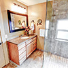 Everett 1901 Home Master Bath After;Showing the Custom Maple Vanity with Quartz Countertop and undermount sink.
