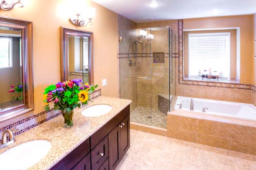 Complete bathroom remodel. Heated Floors. Granite counter tops. Custom tile work. Frameless glass shower enclosure